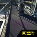 Firmagrip industrial matting installed on elevated walkway, providing certified slip resistance for maintenance access